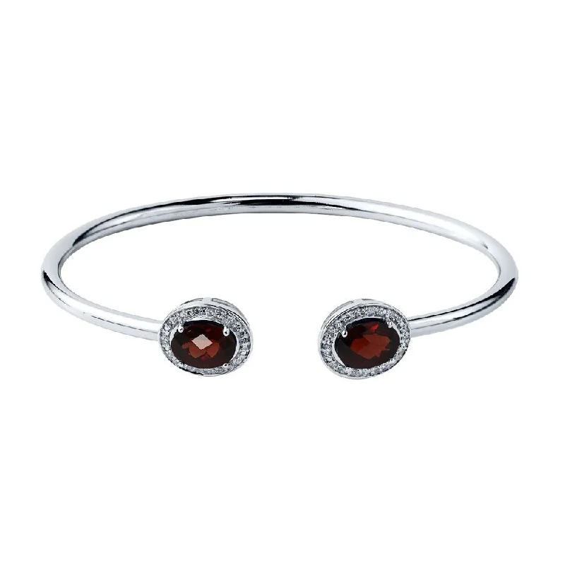 artisan-crafted gold bracelet-Auriya 2 3/4ct Oval Red Garnet Gold over Silver Bangle Bracelet with Diamond Accents