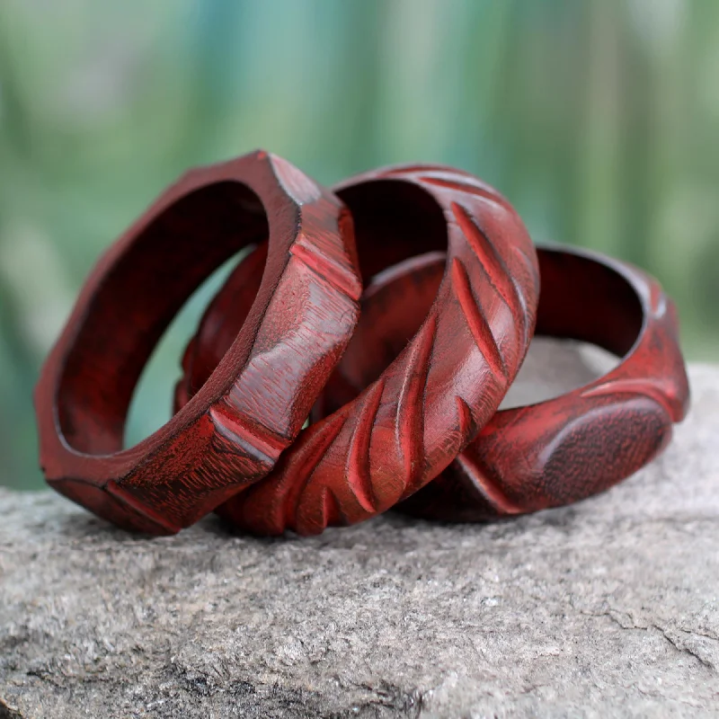 rustic ruby beaded bracelet-Indian Romance Hand Carved Mango Wood Bangle Bracelets India (Set of 3)