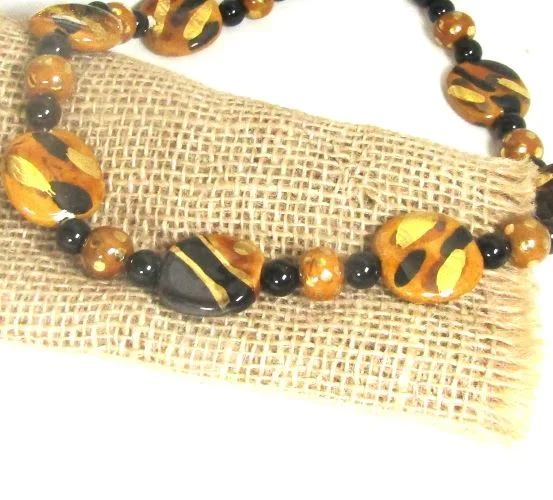 bold emerald peak ridge necklace-Black & Gold Kazuri Handmade Bead Necklace