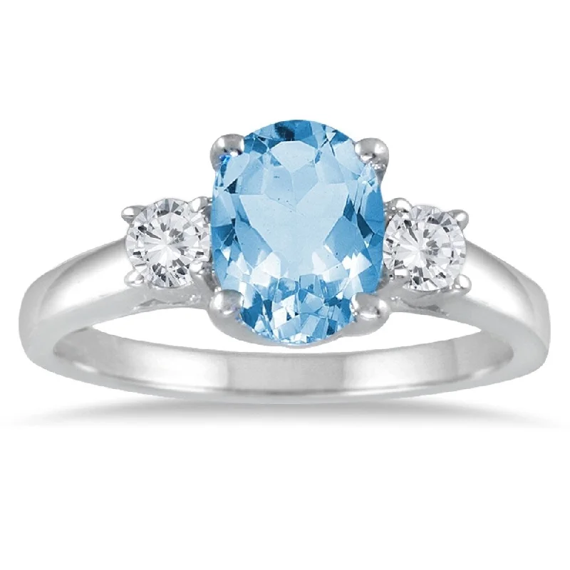 minimalist ridge peak ring-1 3/4 Carat Blue Topaz and Diamond Three Stone Ring 14K White Gold