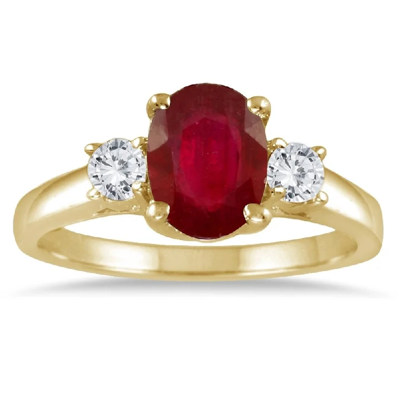 gothic-inspired bat wing ring-1.35 Carat Ruby and Diamond Three Stone Ring in 14K Yellow Gold