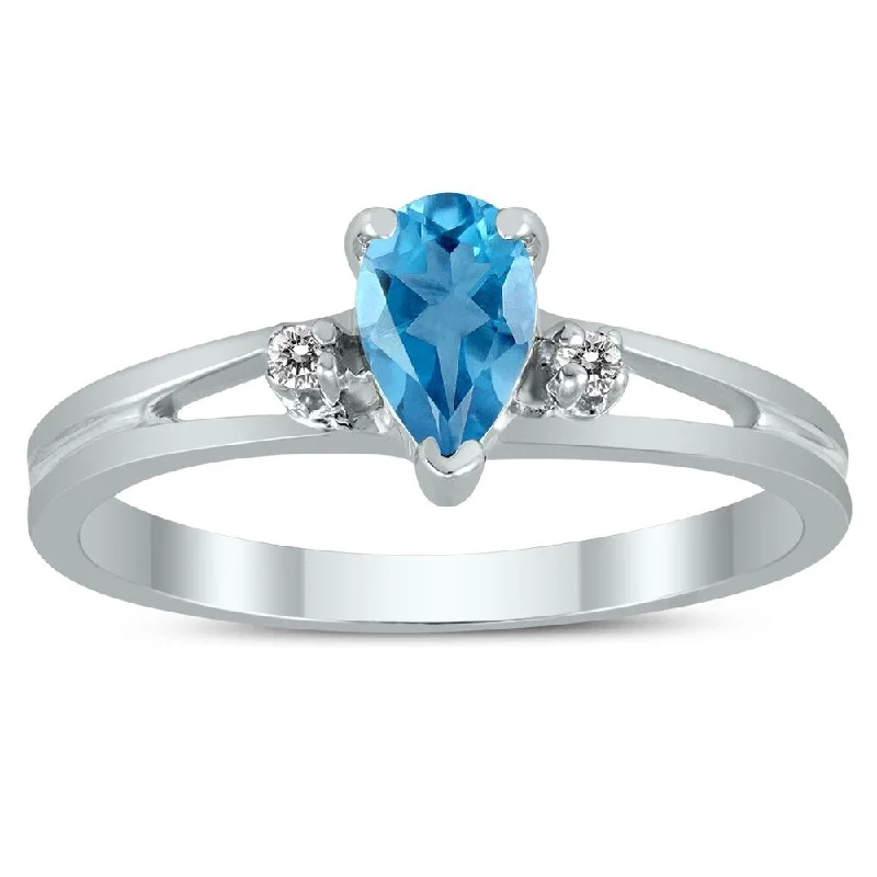 raw turquoise accent ring-6X4MM Blue Topaz and Diamond Pear Shaped Open Three Stone Ring in 10K White Gold