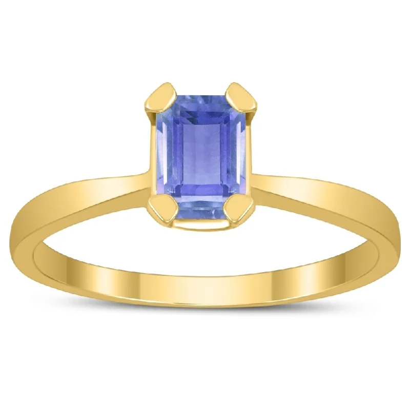 floral-inspired carnelian ring-Emerald Shaped 6X4MM Tanzanite Solitaire Ring in 10K Yellow Gold