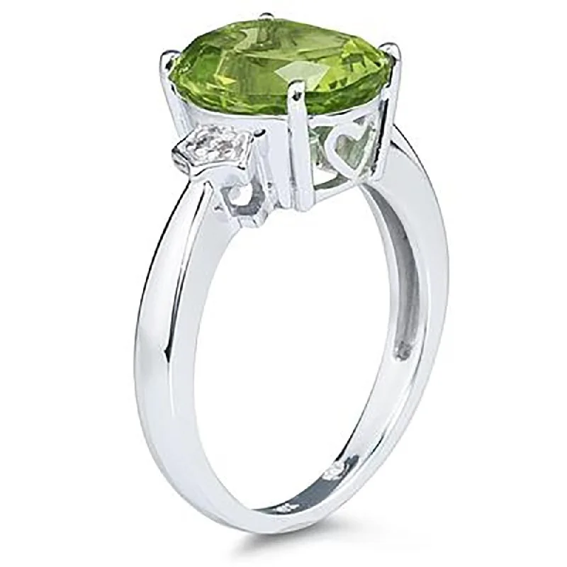 gothic-inspired scorpion tail ring-Peridot & Diamond Ring in 10k White Gold