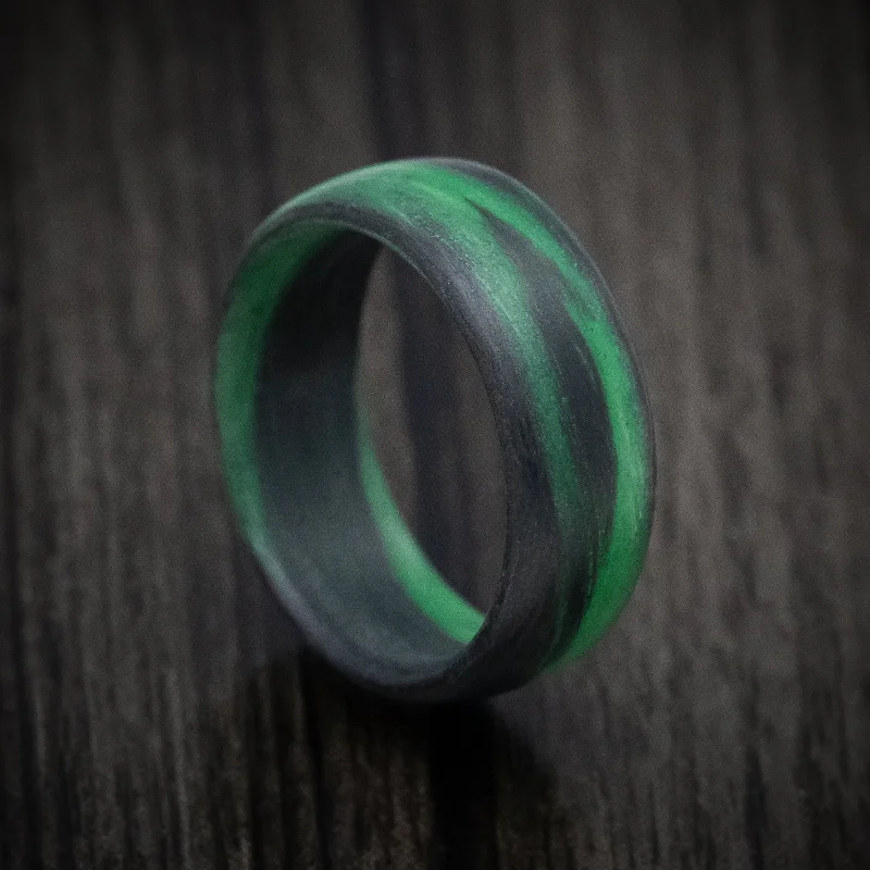 vintage-style moonstone ring-Carbon Fiber Men's Ring with Green Glow Marbled Design