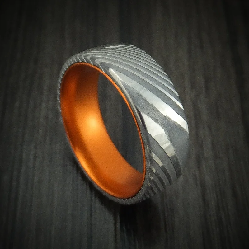 gothic-inspired hawk talon ring-Damascus Steel Men's Ring With Anodized Sleeve Custom Made